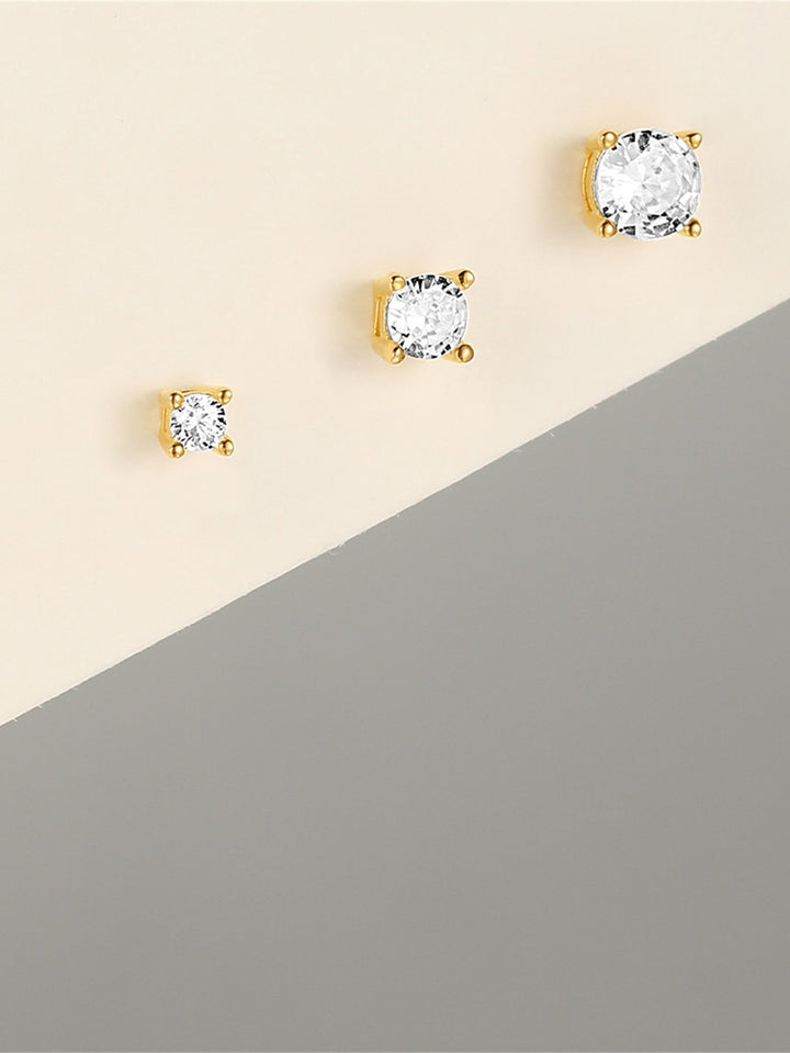 Eveline – Zarte goldene Ohrringe mit elegantem Schwung.