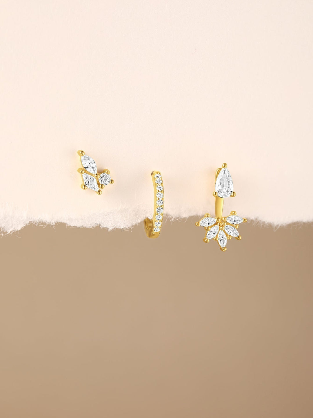 Magda – Zarte goldene Ohrringe mit sanftem Glanz.