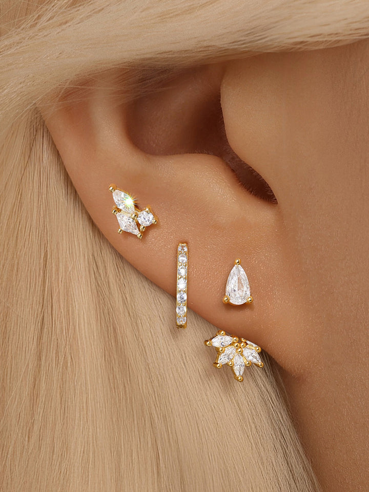 Magda – Zarte goldene Ohrringe mit sanftem Glanz.