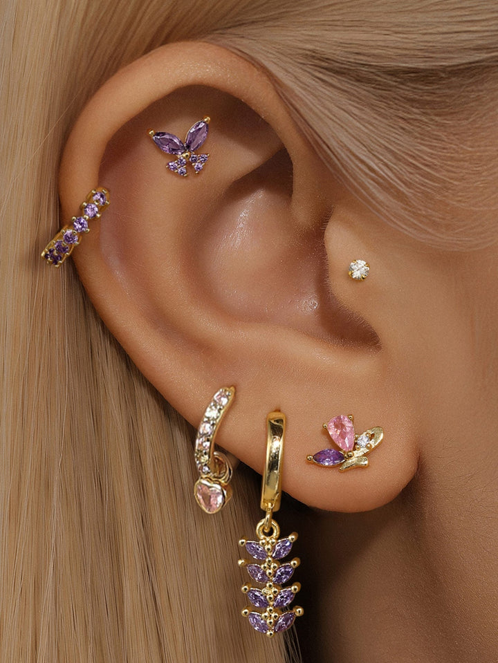 Greta – Zarte goldene Ohrringe mit dezentem Schwung.