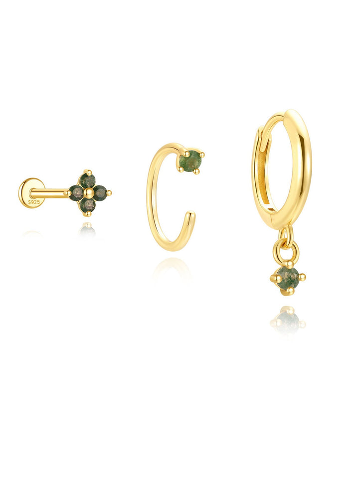 Mona – Goldene Ohrringe mit fließendem Design.