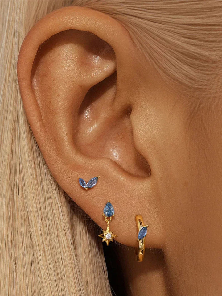 Petra – Feine goldene Ohrringe mit organischem Design.