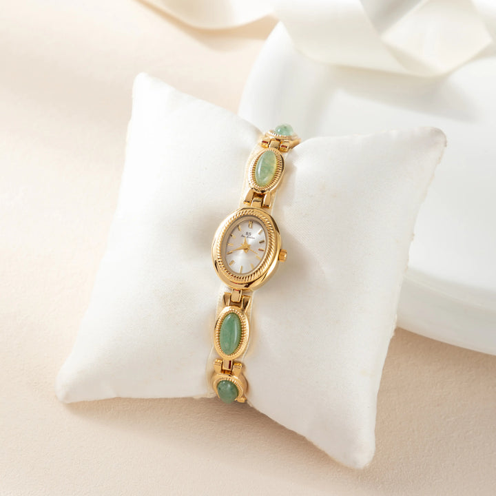 Klara – Goldene Uhren mit länglichem Ziffernblatt.