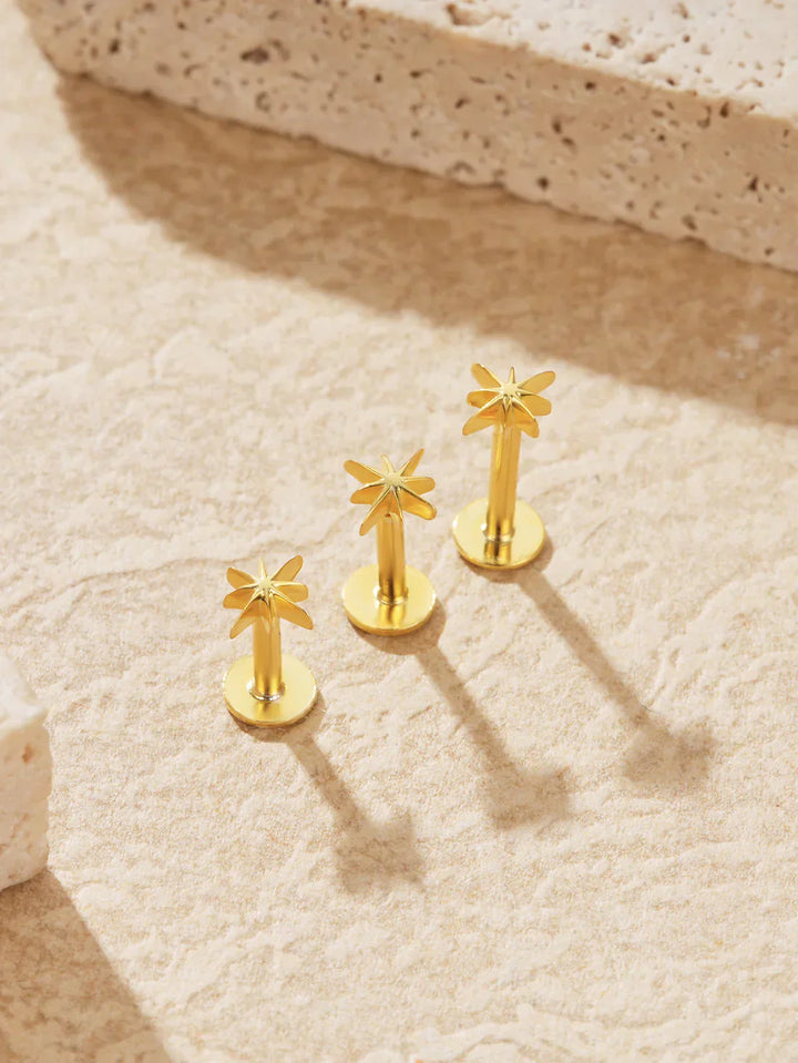 Katrin – Goldene Ohrringe mit sanfter Krümmung.