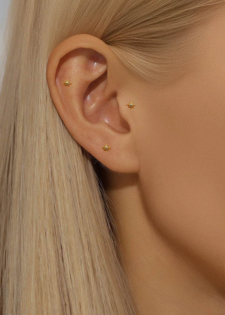 Katrin – Goldene Ohrringe mit sanfter Krümmung.