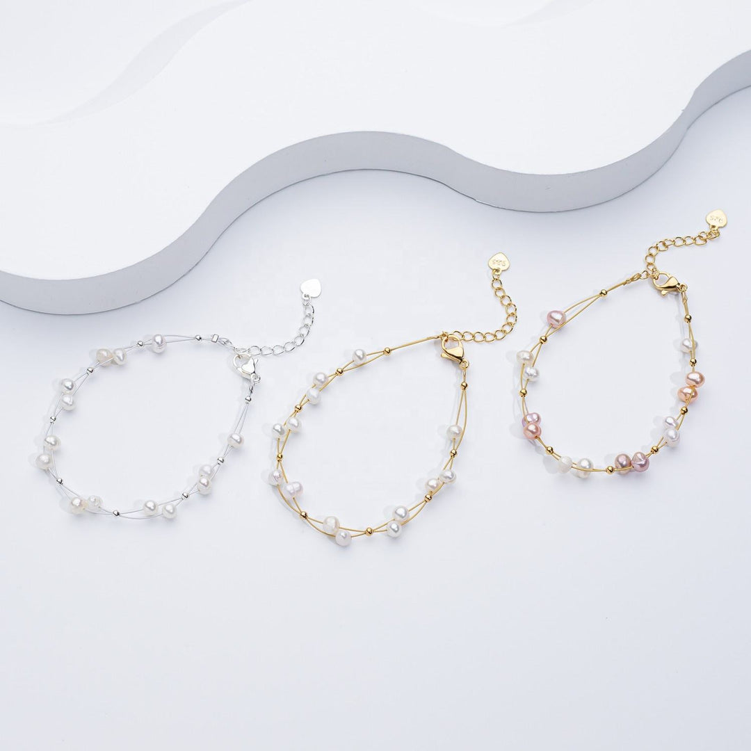 Marlene – Goldarmband mit Perlenakzenten.