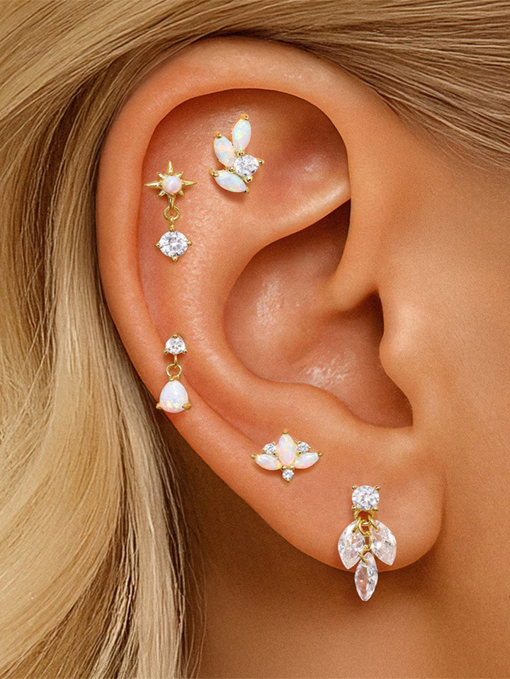 Katherine – Zarte goldene Ohrringe mit Bewegung.