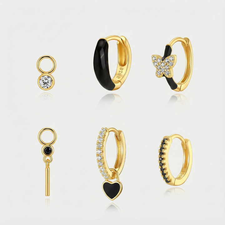 Theresia – Goldene Ohrringe mit sanfter Krümmung.